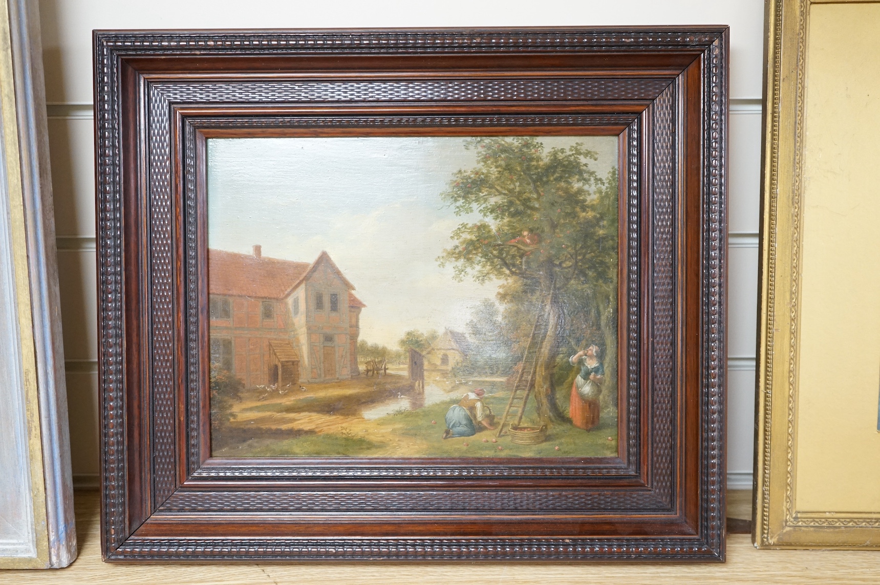 In the Manner of Johann Dietrich Findorff (1722-1772), oil on board, Rural scene with figures picking apples, indistinctly signed, 23 x 29cm. Condition - good